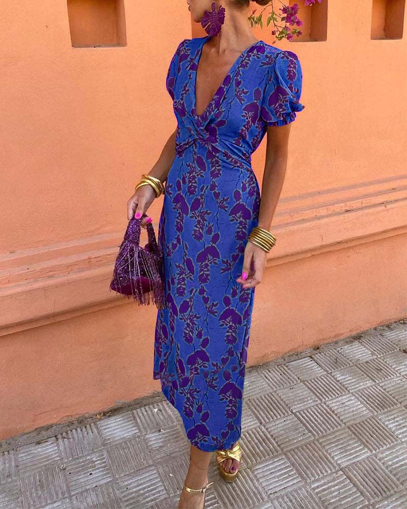 Aria™ - Elegante Vestido Maxi con Escote en V y Patrón de Hojas