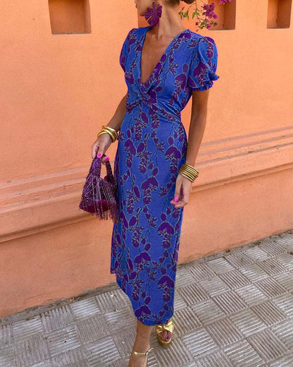 Aria™ - Elegante Vestido Maxi con Escote en V y Patrón de Hojas