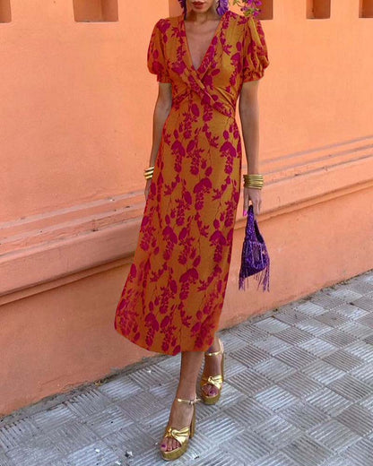 Aria™ - Elegante Vestido Maxi con Escote en V y Patrón de Hojas