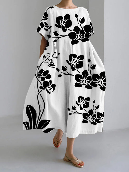 Cassidy - Vestido Floral Negro Flowy Atemporal