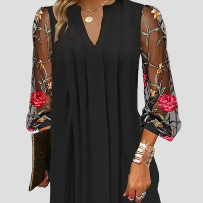 Natalia - Elegante minivestido con mangas transparentes