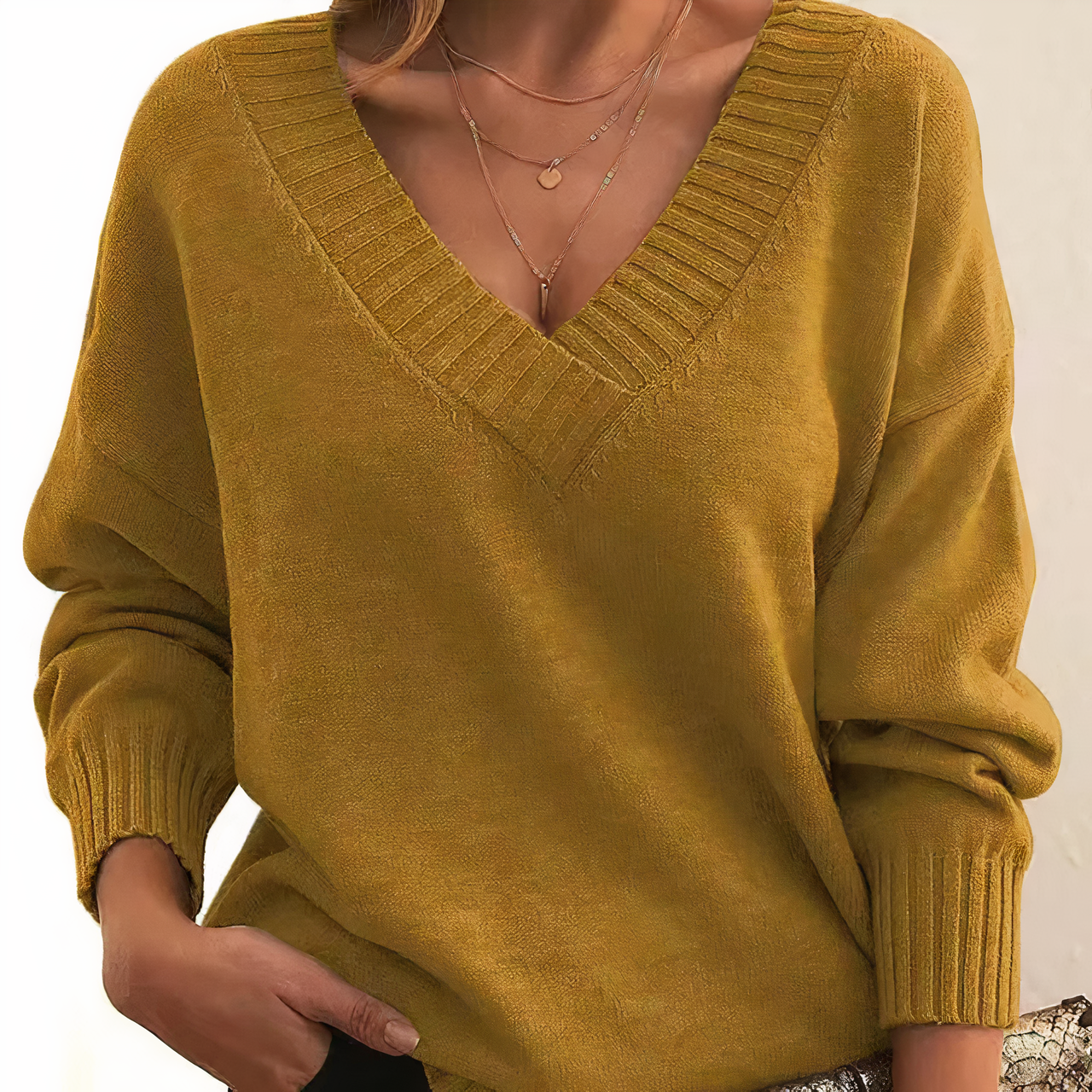 Aria | Suéter Relaxed Fit con Profundo Escote en V Chic