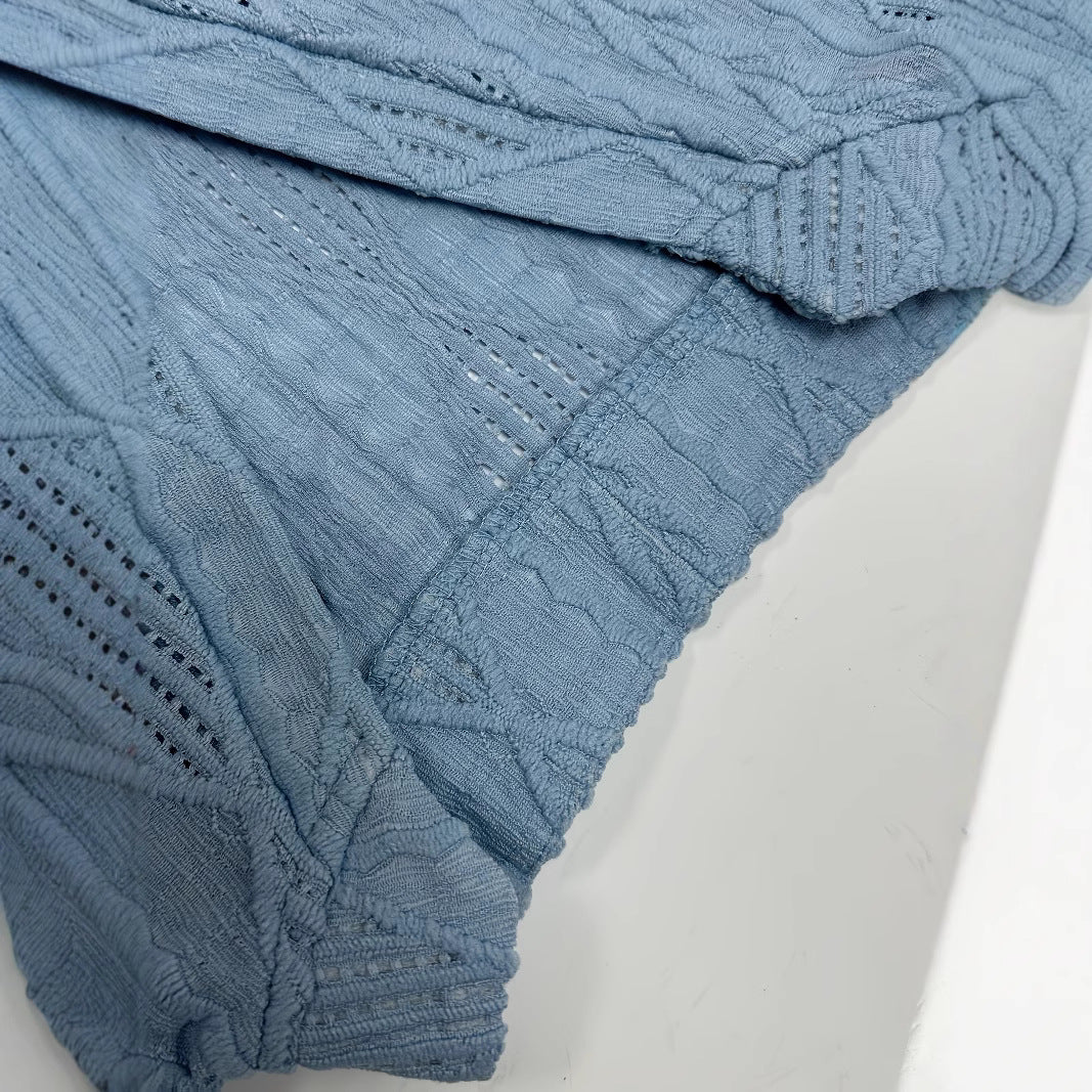 Alicia – Blusa con escote en V