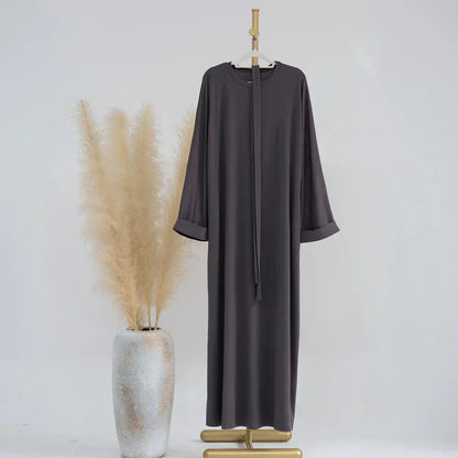 Ariane - Elegante Abaya de Punto con Cinturón y Bolsillos Laterales