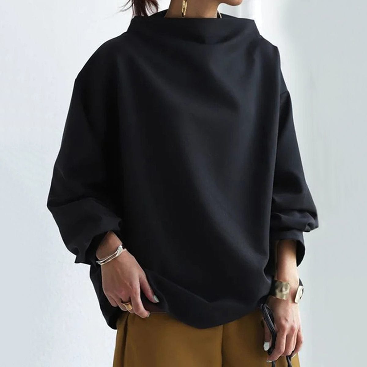 Elly | Top de Punto Suave con Cuello Alto