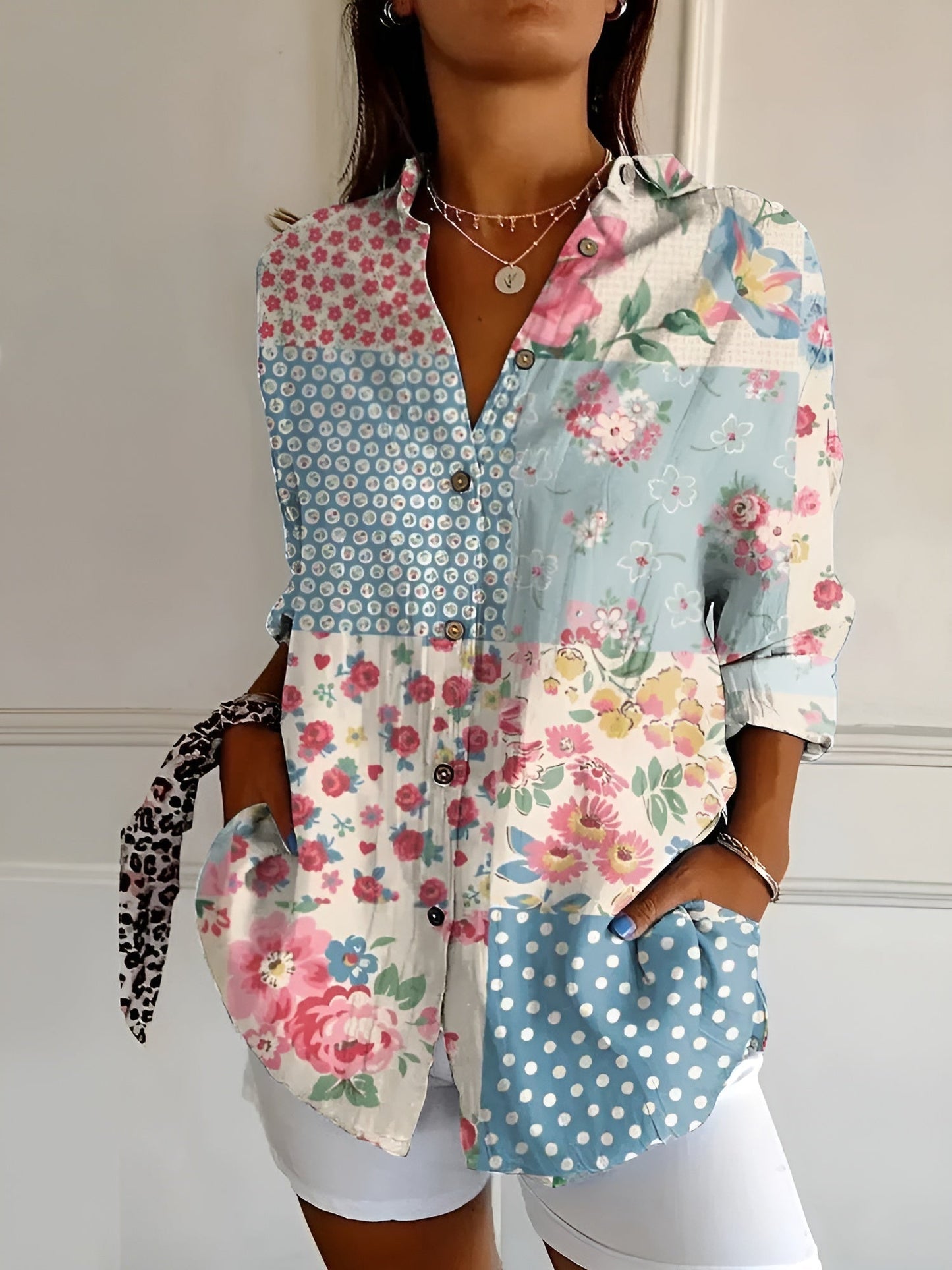 BLUSA FLORAL DESIREE CON BOTONES