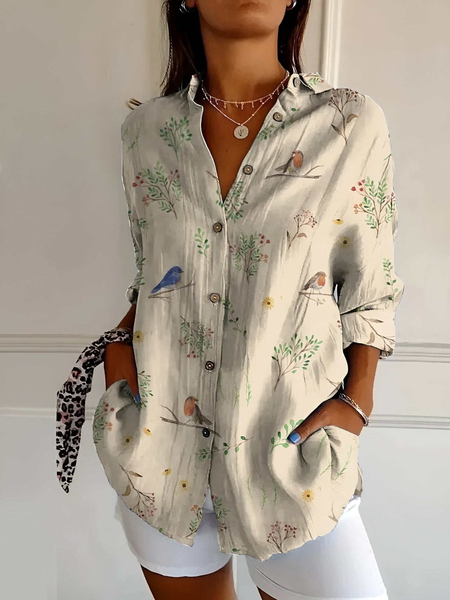 BLUSA FLORAL DESIREE CON TAPETA DE BOTONES