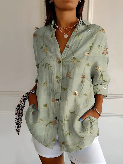 BLUSA FLORAL DESIREE CON TAPETA DE BOTONES