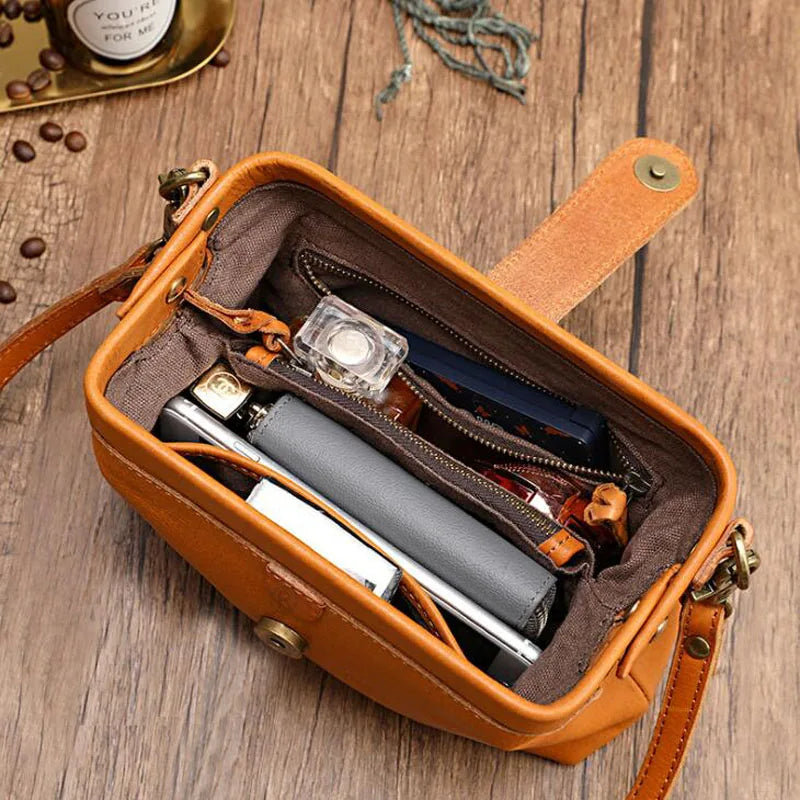 Herdis | Bolsa clásica y compacta en cálido tono cognac
